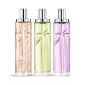 Photo de produit de l’ensemble de superposition Starlicious Yummy Swirl réunissant Pineapple Musk, Pistachio Praline et Berry Licorice, avec leurs flacons de verre ornés d’une étoile filante sculptée dont les facettes brillent intensément sous un élégant capuchon argenté.